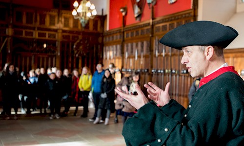 Costumed performer dressed as Rabbie Burns in the Great Hall at Edinburgh Castle