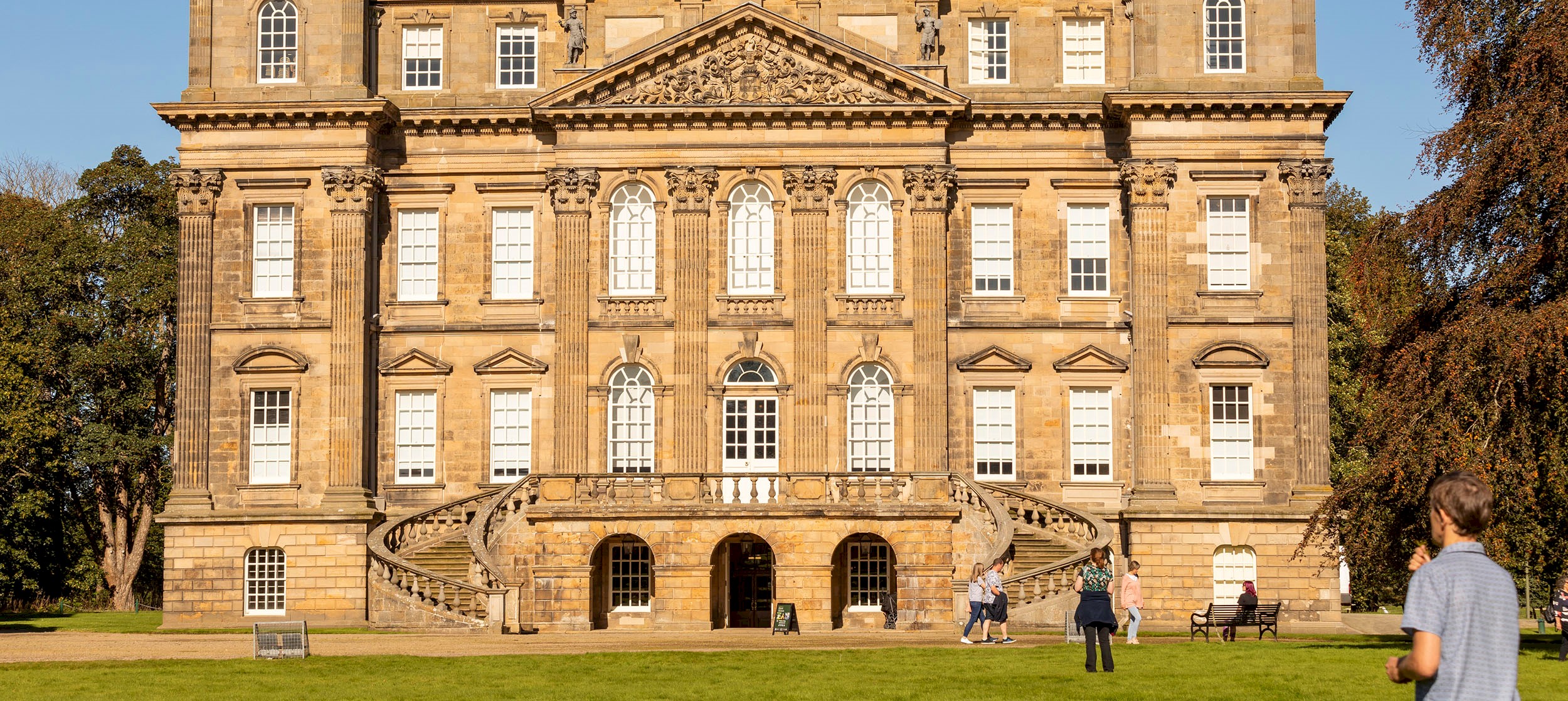 Exterior view of Duff House with blue skies above