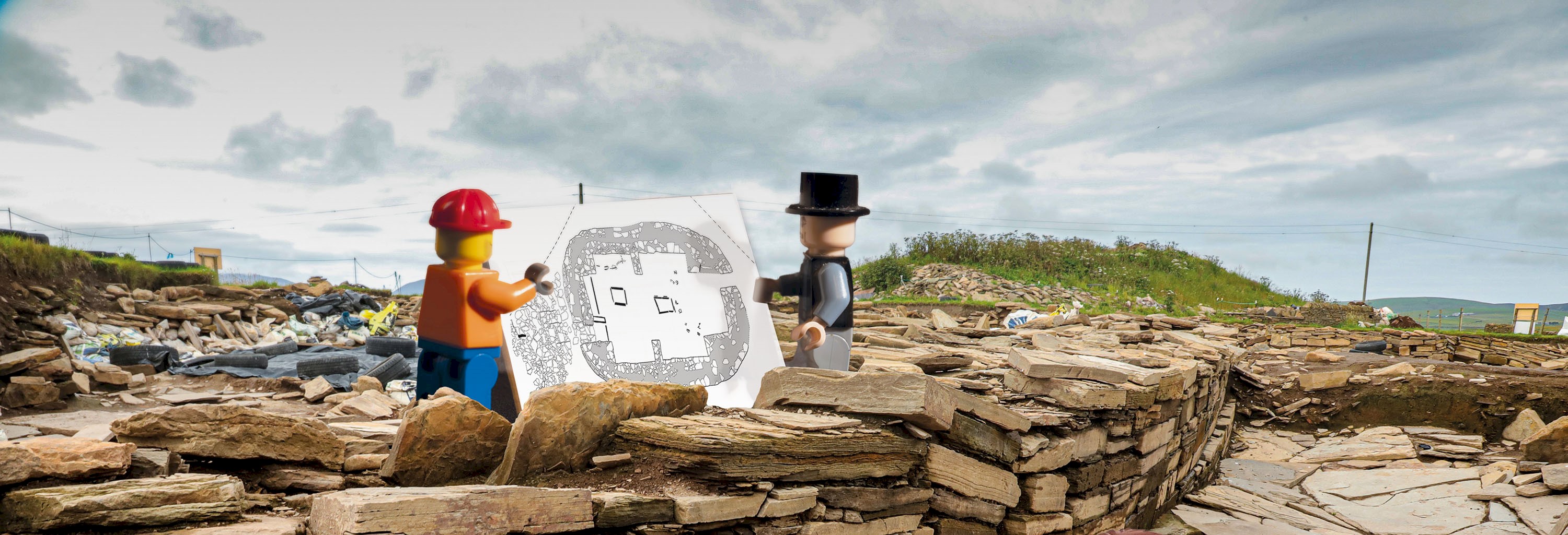Two lego figures standing on ancient stones 