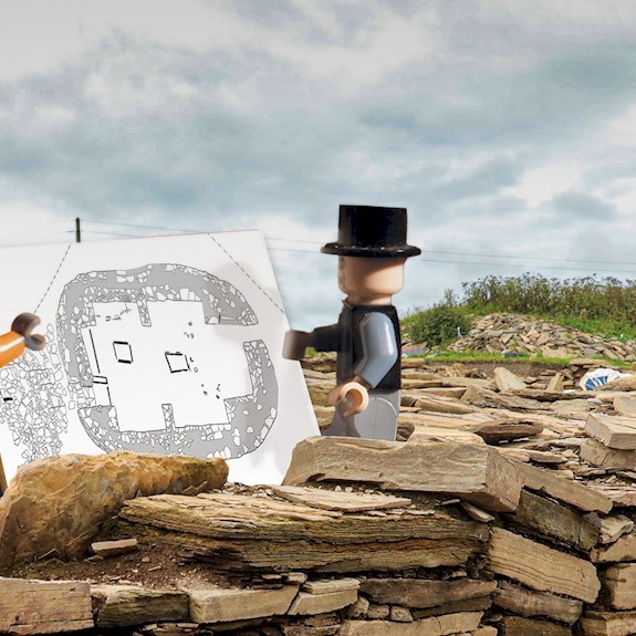 Two lego figures standing on ancient stones 