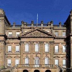 Exterior view of a splendid baroque mansion bathed in blue sky