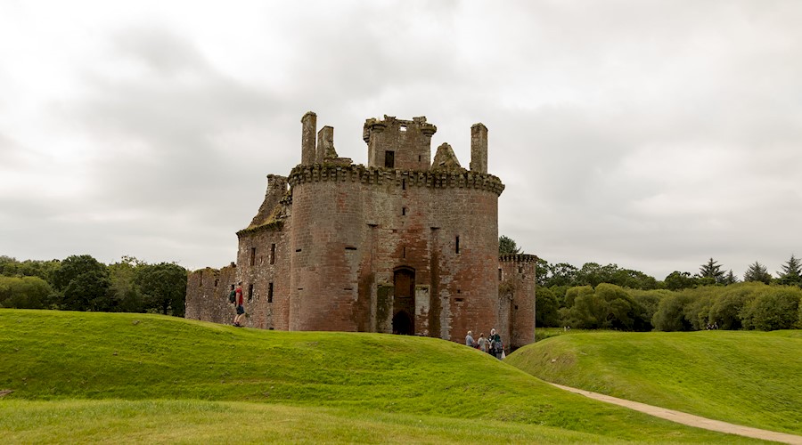 General view of the entrance to Caerlaverock Castle and moat 