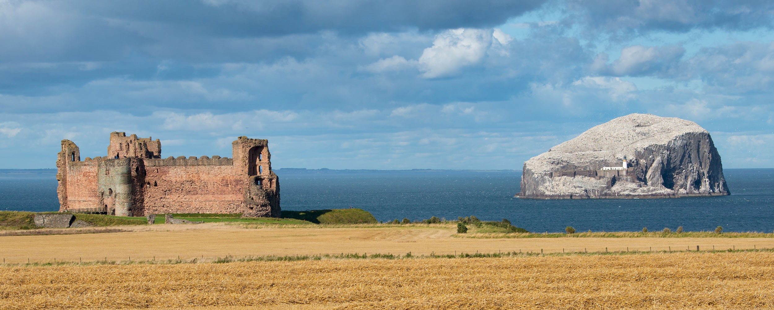 General view of the exterior of Tantallon Castle and Bass Rock