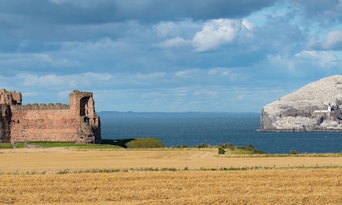 General view of the exterior of Tantallon Castle and Bass Rock
