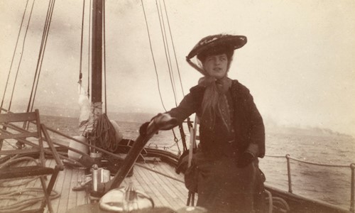 View of woman on sailing boat, probably 'Gadfly'.
