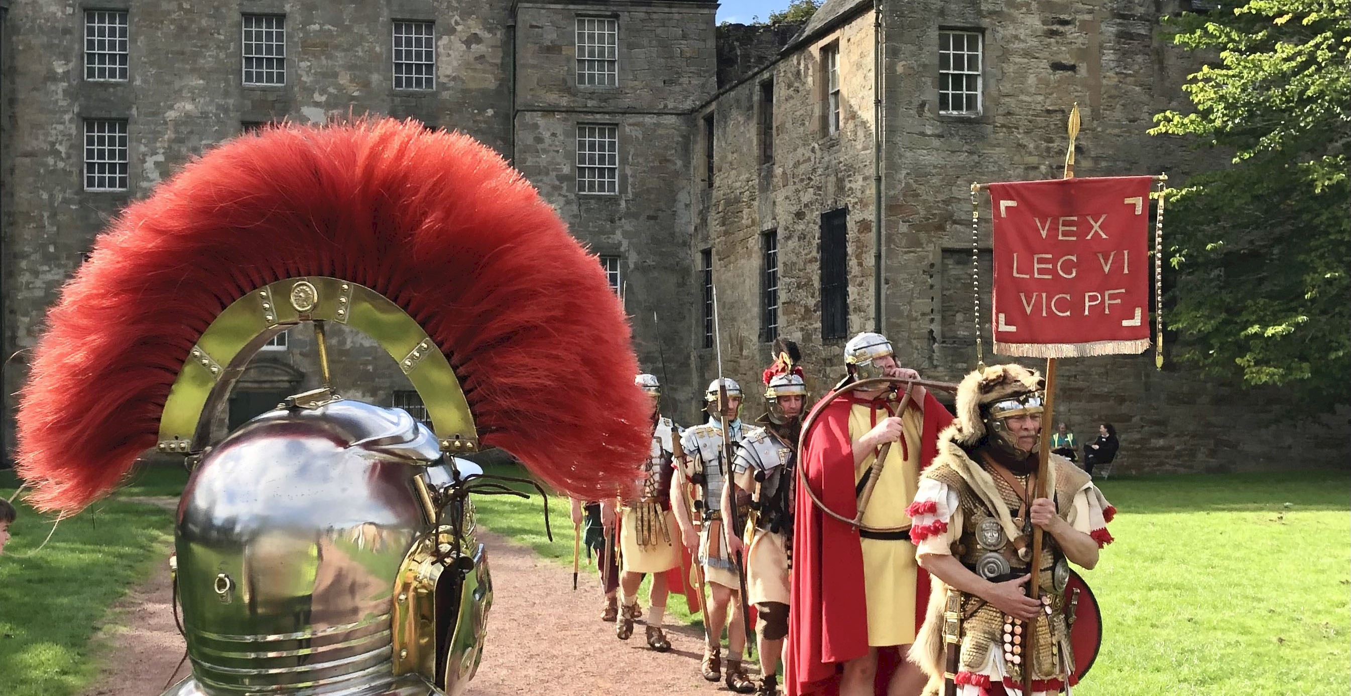Re-enactors dressed as Romans outside Kinneil House