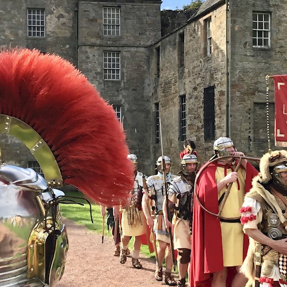 Re-enactors dressed as Romans outside Kinneil House