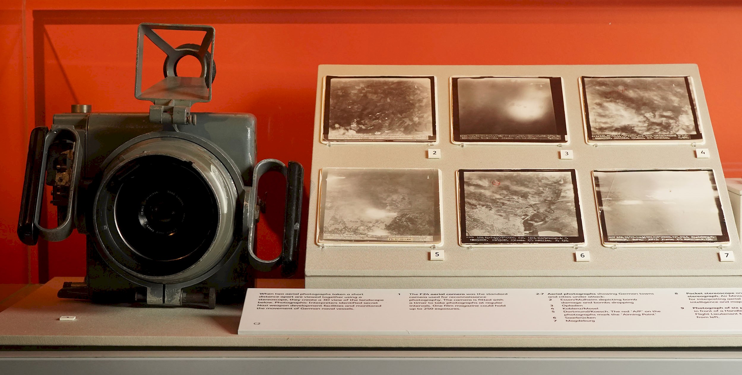 F24 aerial camera with a five inch lens and hand grip mounting, used by the Royal Air Force for reconnaissance during the Second World War.