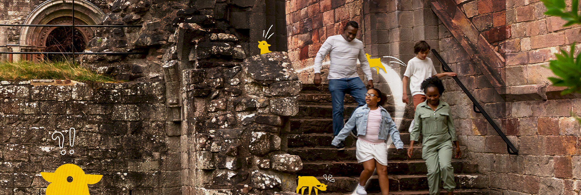 4 people running down stairs in a ruinness castle with yellow lambs superimposed on the picture