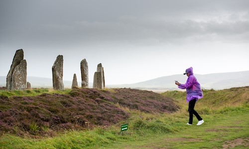 Visitors at the Ring of Brodgar, Orkney.