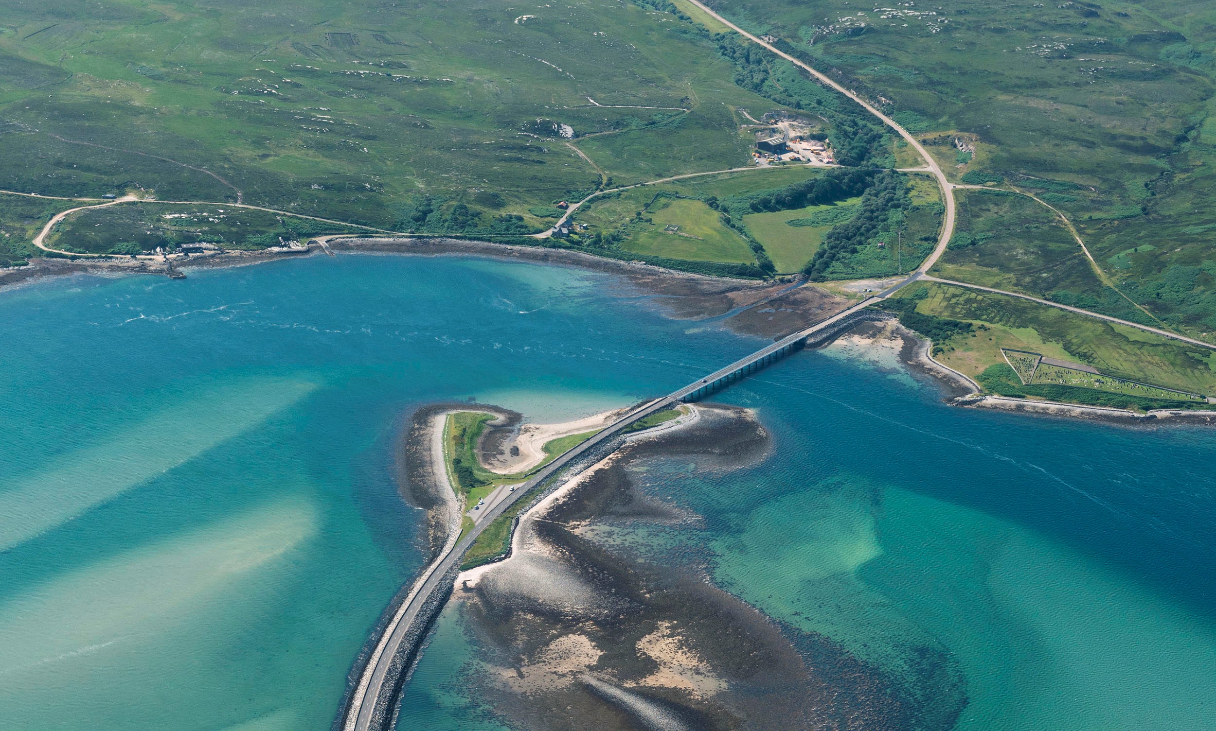 Oblique aerial view of Kyle of Tongue Bridge and the causeway, looking to the West